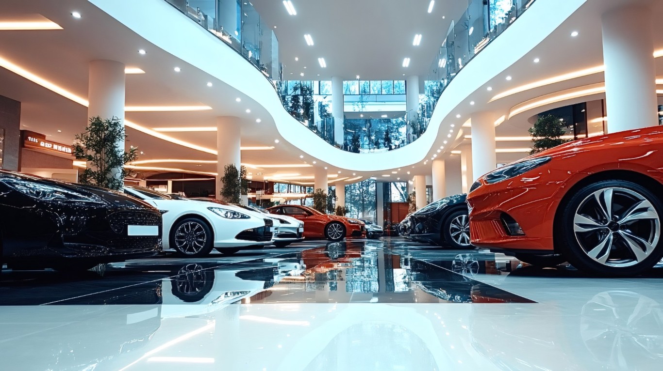 new-cars-sitting-in-modern-dealership-showroom_57502553 (Large) (Medium)